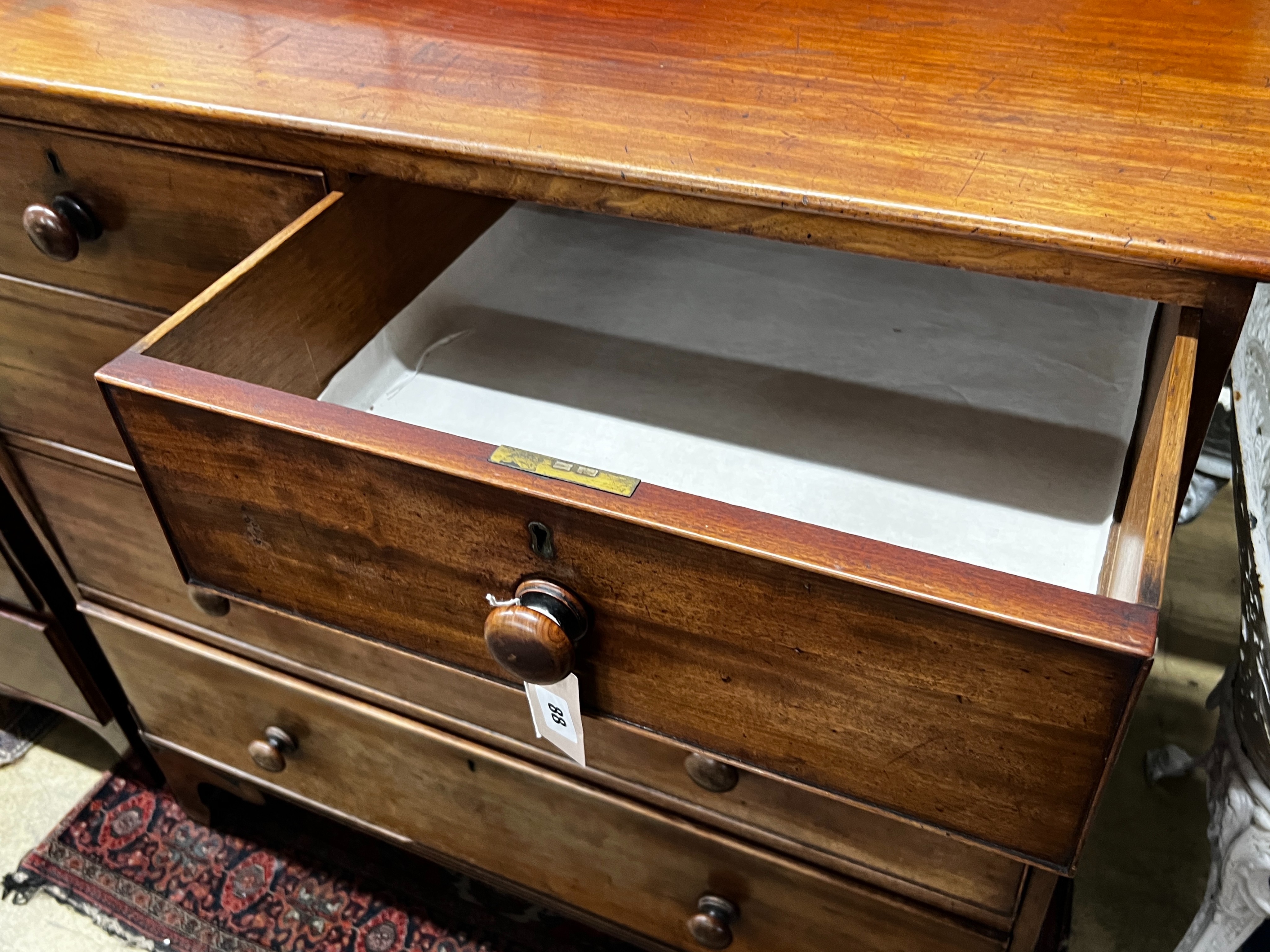 A Regency mahogany chest of two short and three long drawers, width 109cm, depth 54cm, height 108cm